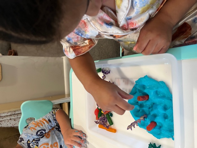 Building an ocean scene in blue kinetic sand