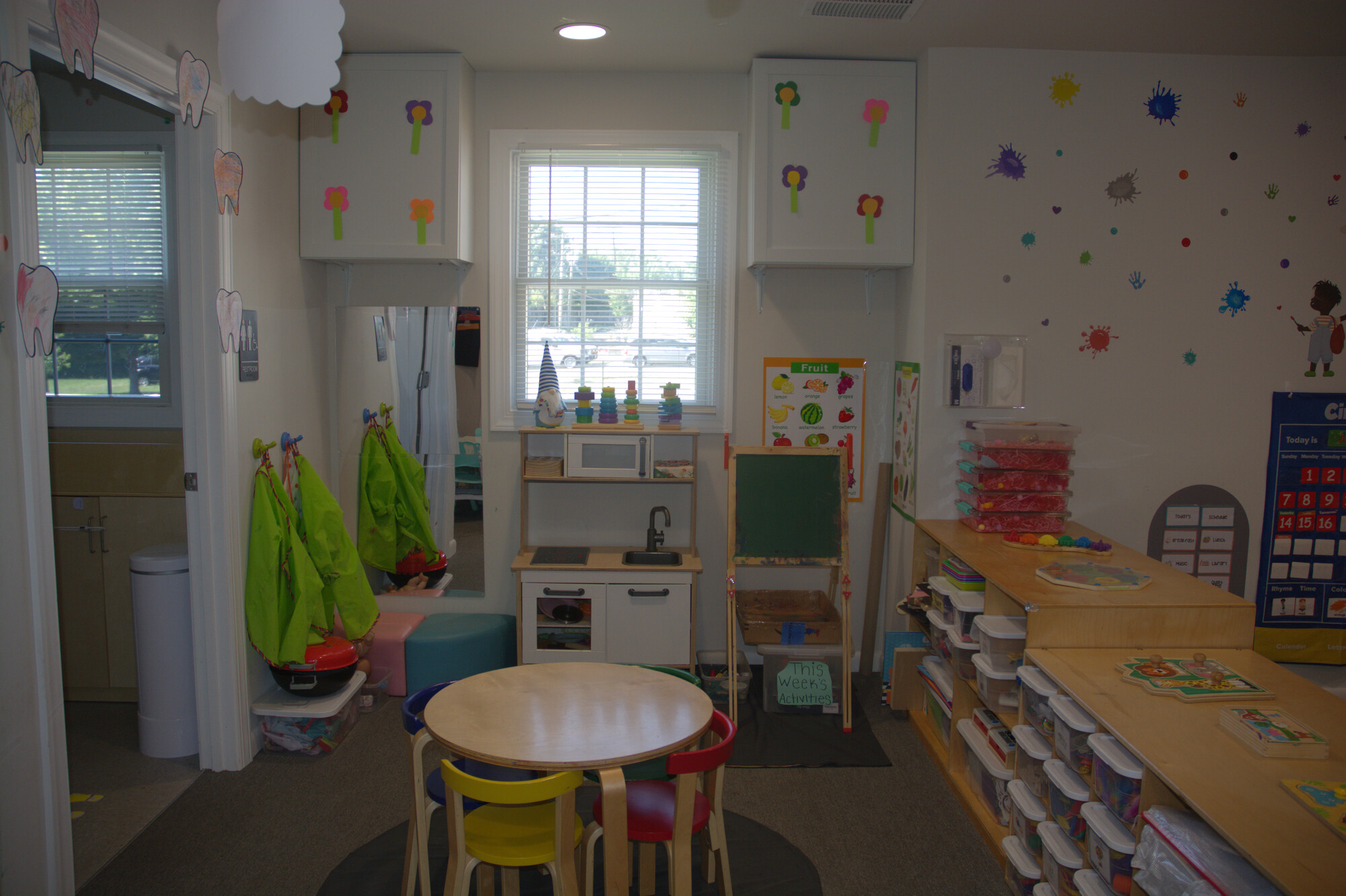 Pretend play kitchen area in the toddler classroom