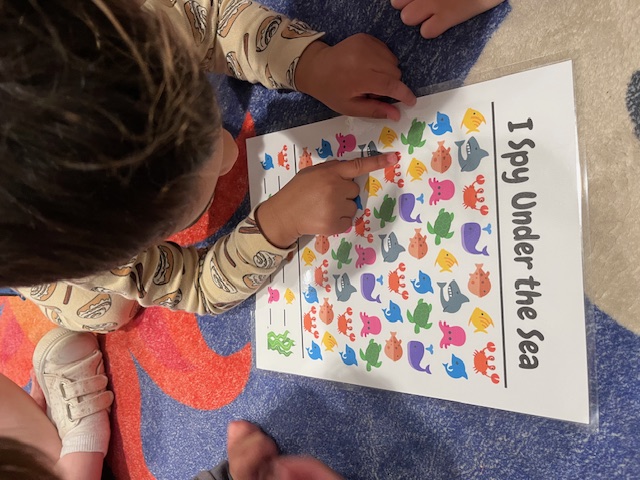 Children playing an I Spy Under the Sea counting game